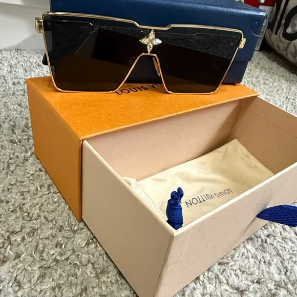 Authentic Louis Vuitton Black and Gold Star Detail Sunglasses - Picture 1 of 3